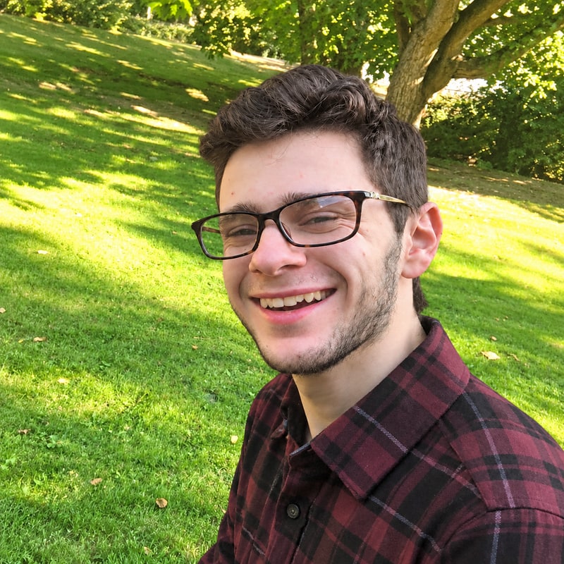 Noah Balch smiling outdoors